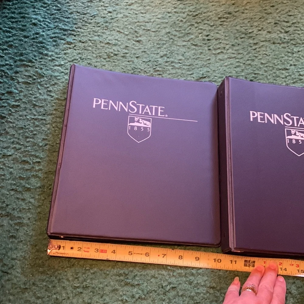 2 Penn state binders. Rough measurements in photos.